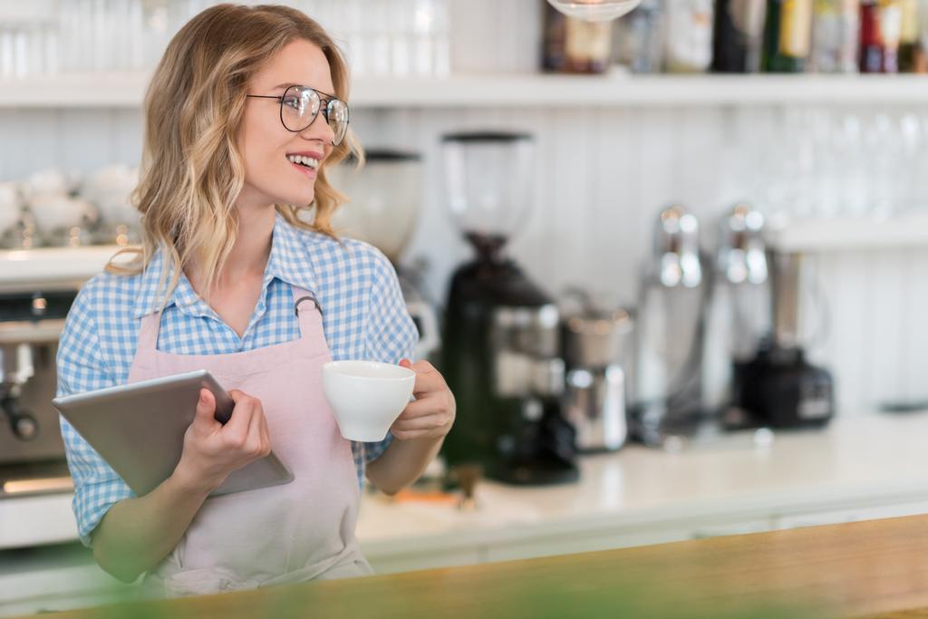 waitress with tablet in cafe - Photo, Image