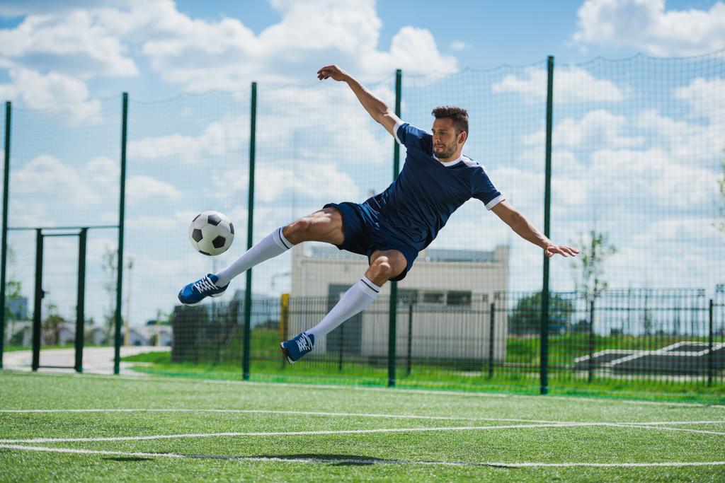 Football Or Soccer Shot With A Neutral Design Ball Being Kicked, With  Motion Blur On The Foot And Natural Background Stock Photo, Picture and  Royalty Free Image. Image 27280599.