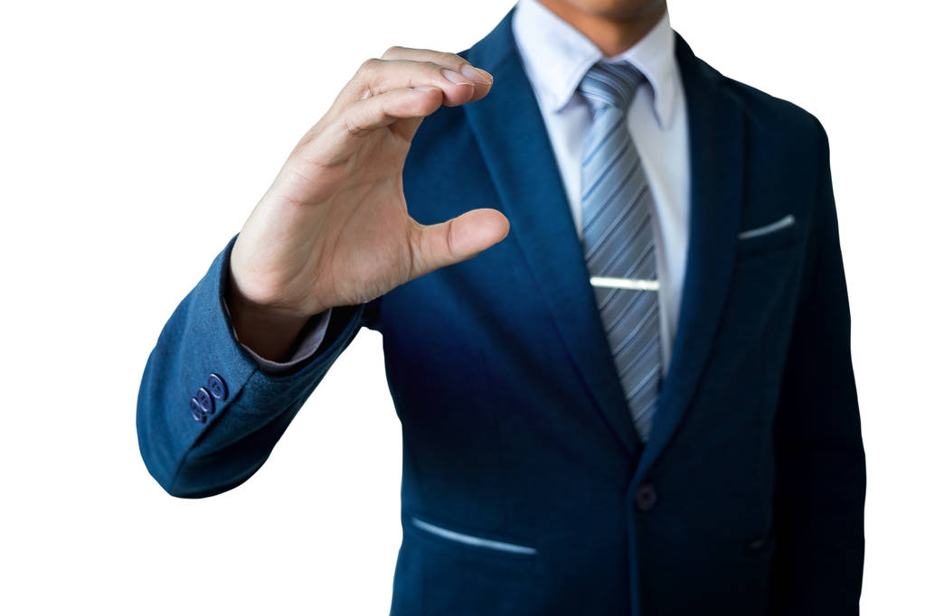 Die Hand eines Geschäftsmannes hält etwas auf weißem Hintergrund - Foto, Bild