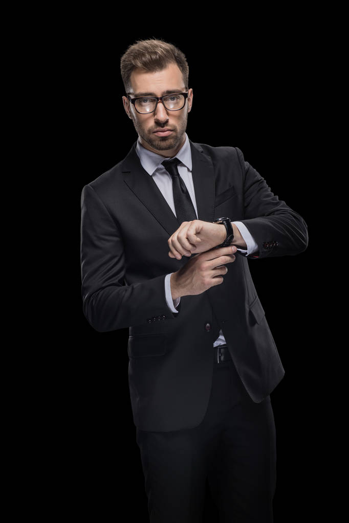 Selbstbewusster Geschäftsmann mit Uhr - Foto, Bild