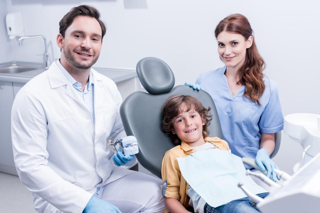 dentists and boy in dental clinic - Photo, Image