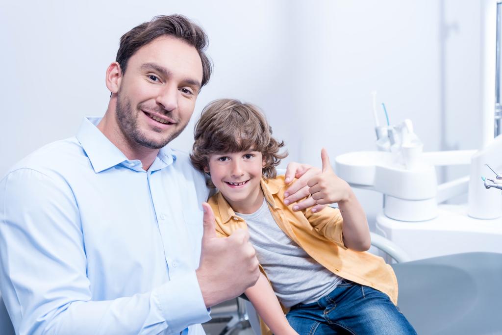 dentist and boy in dental clinic - Photo, Image
