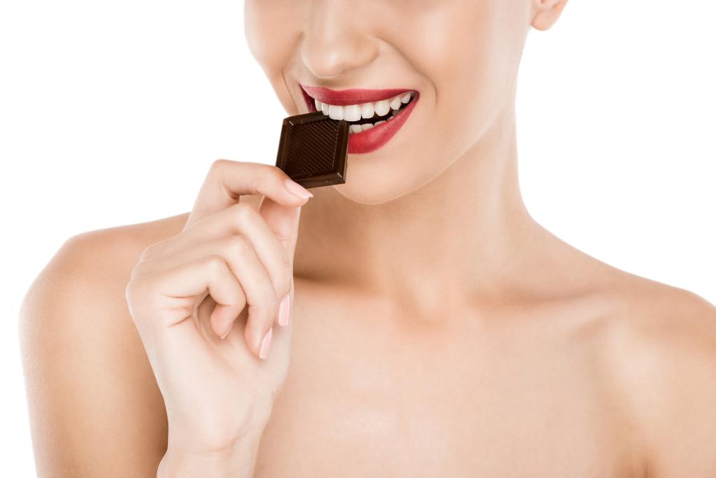 Kobieta jedząca czekoladę  - Zdjęcie, obraz