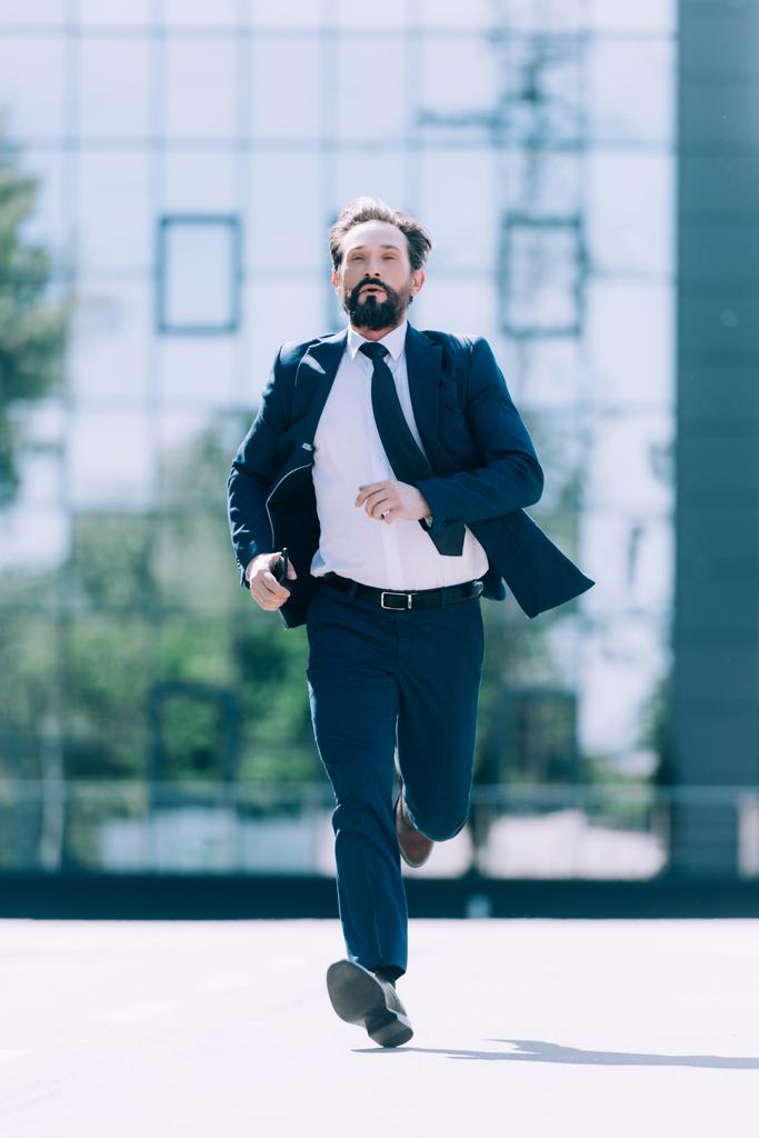 mature businessman running - Photo, Image