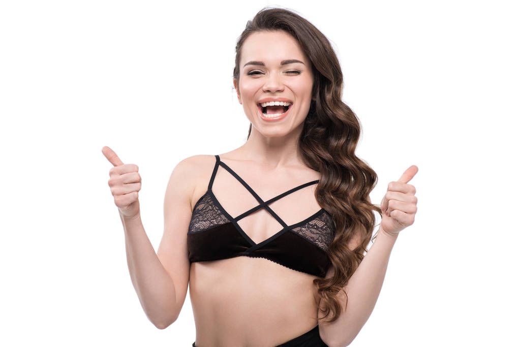 young woman with thumbs up - Photo, Image