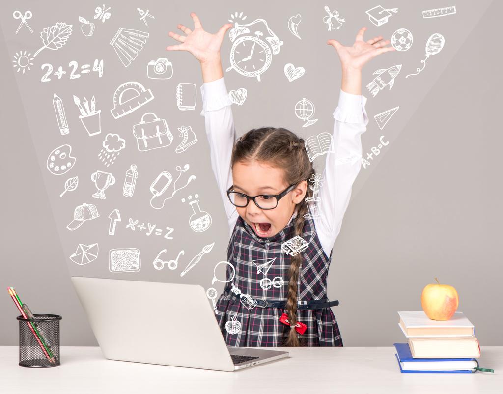 excited schoolgirl with laptop - Photo, Image