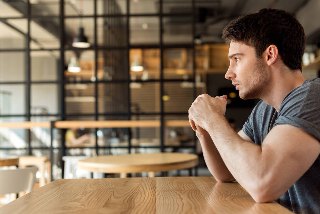 thoughtful man in cafe - Photo, Image