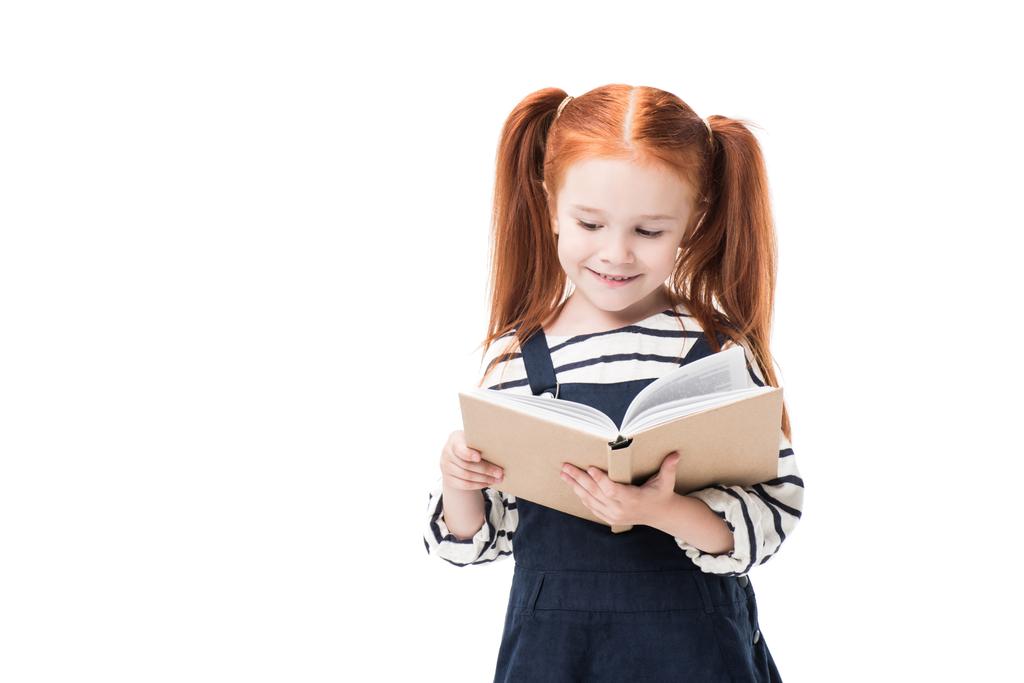 Schoolgirl holding book - Photo, Image