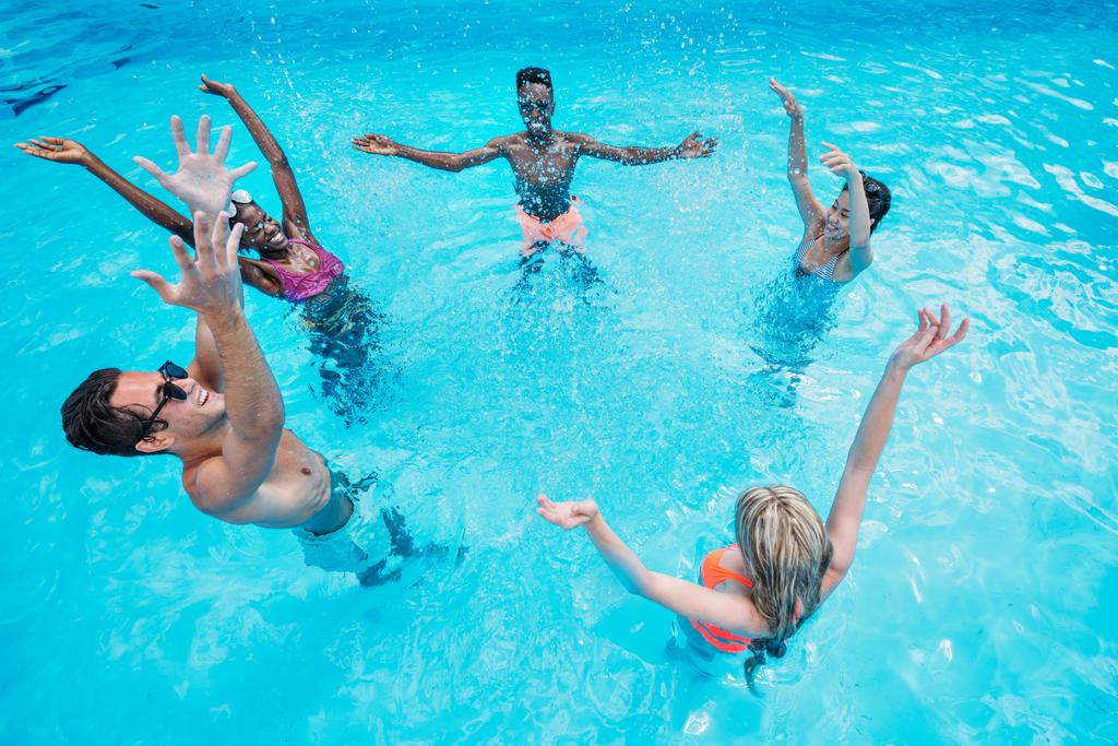 multiethnic people in swimming pool  - Photo, Image