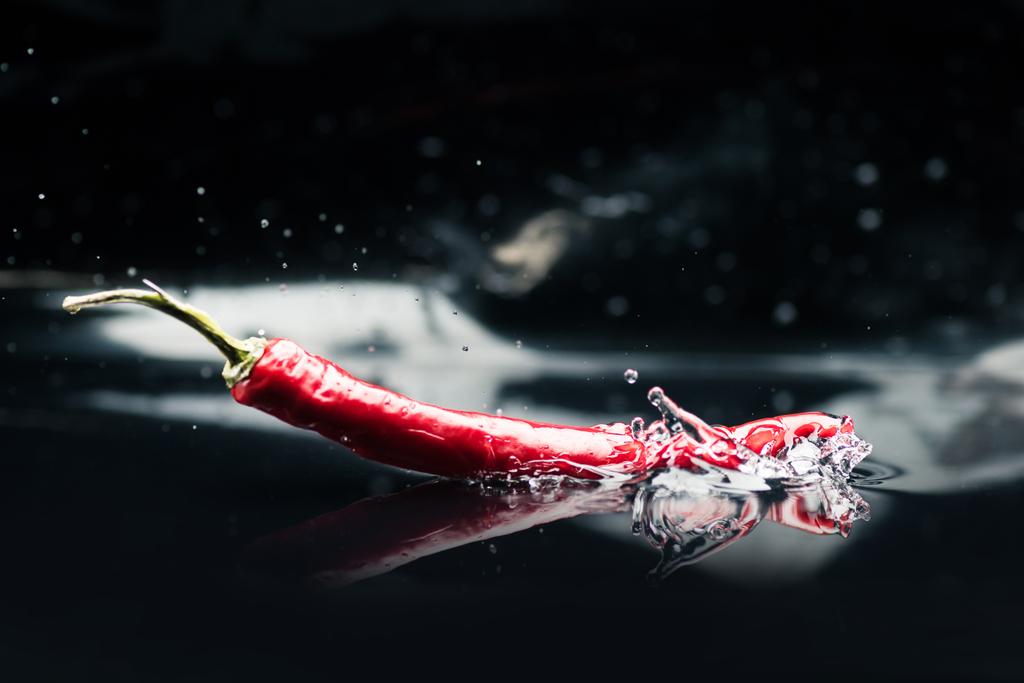chili pepper falling in water - Photo, Image