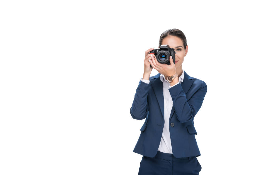 mujer de negocios tomando fotos en cámara
 - Foto, Imagen