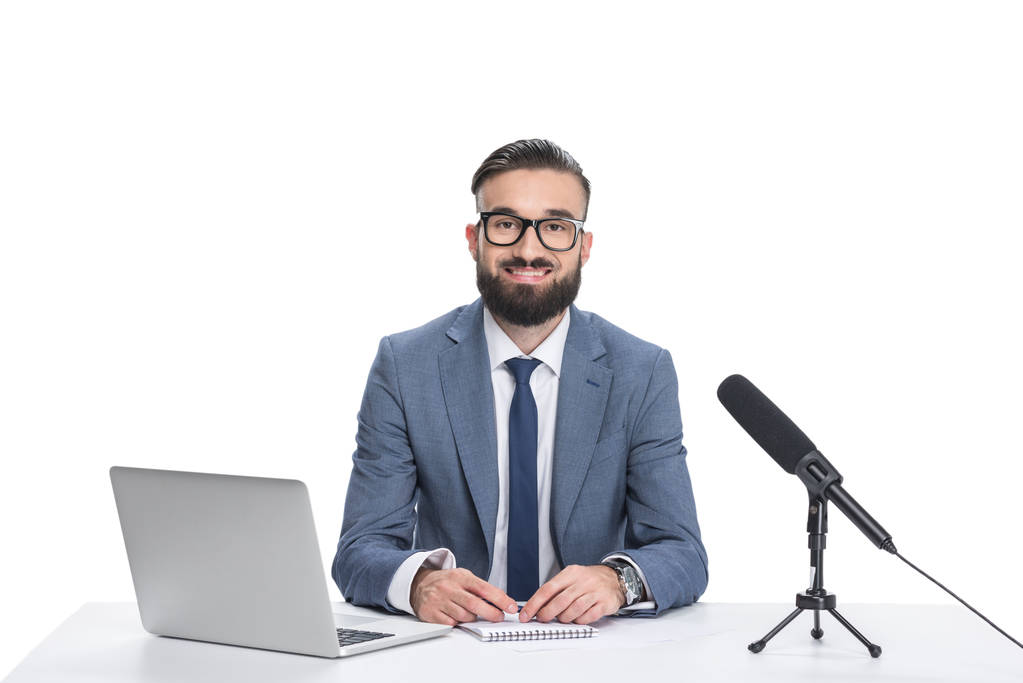 newscaster with laptop and microphone - Photo, Image