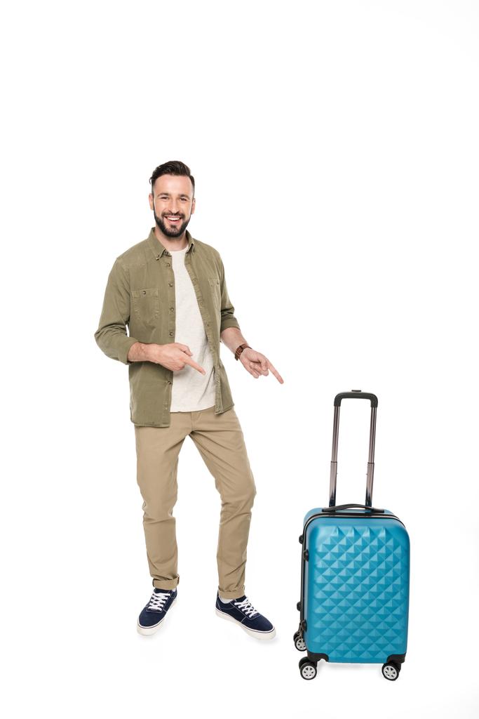 man pointing at suitcase - Photo, Image