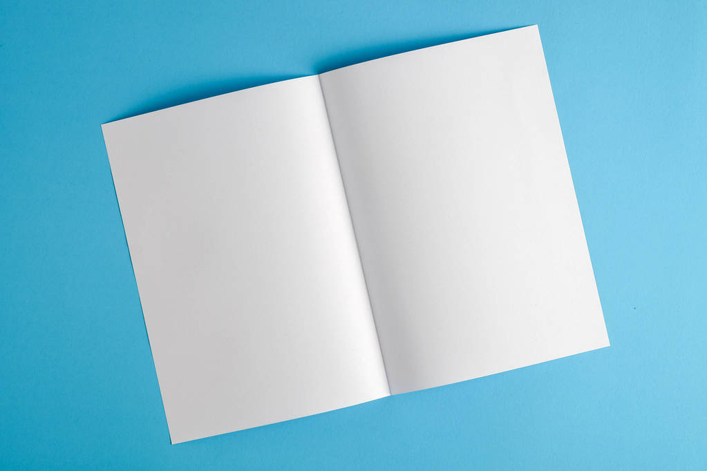 sablon fold fehér könyv a kék háttér - Fotó, kép