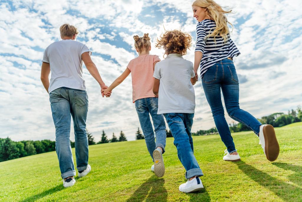 family walking together in park - Photo, Image