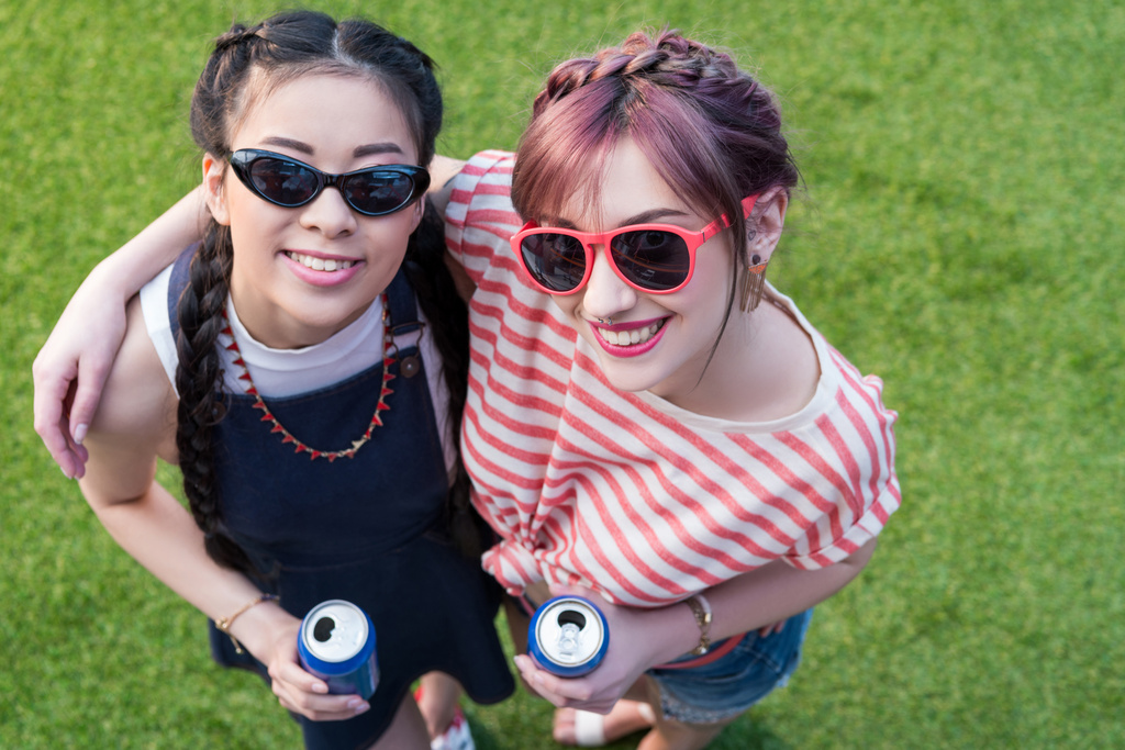 multiethnic girls with soda cans - Photo, Image