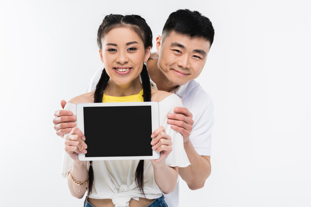 Asian pár digitális tabletta - Fotó, kép
