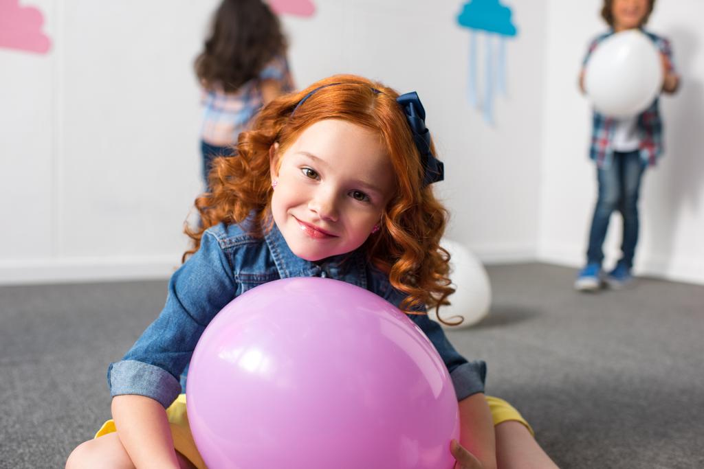 red haired girl with balloon - Photo, Image