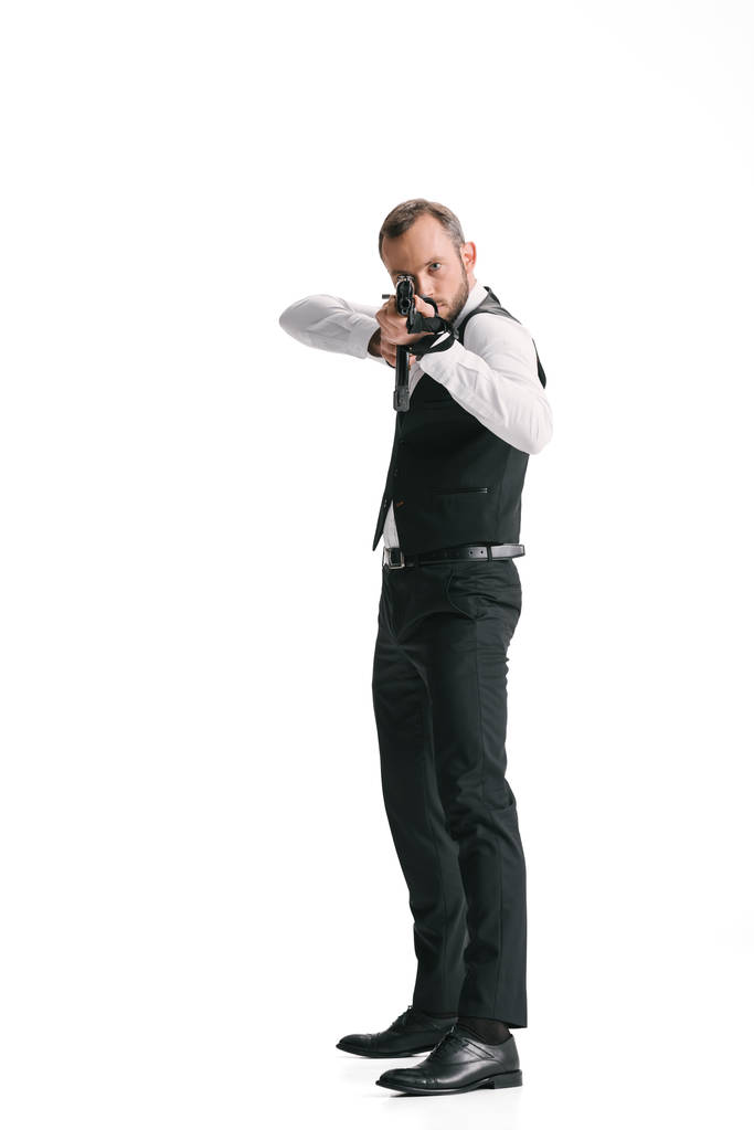 Geheimagent im Anzug mit Gewehr - Foto, Bild