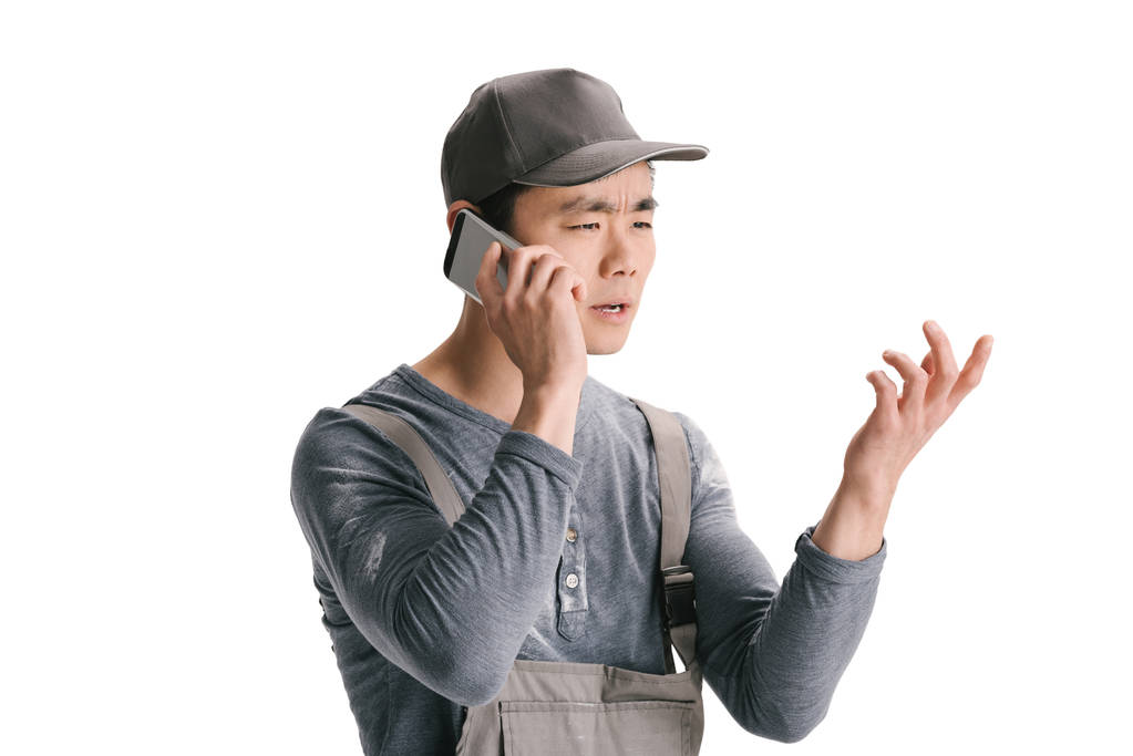 stavební dělník mluví po telefonu - Fotografie, Obrázek