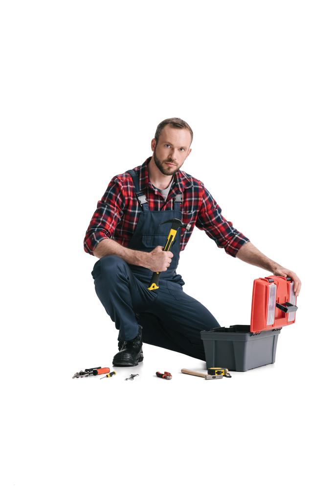 trabalhador da construção com caixa de ferramentas
 - Foto, Imagem