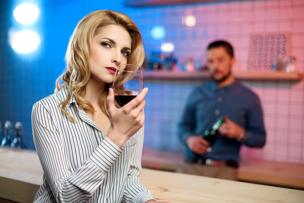 woman drinking wine in bar - Photo, Image