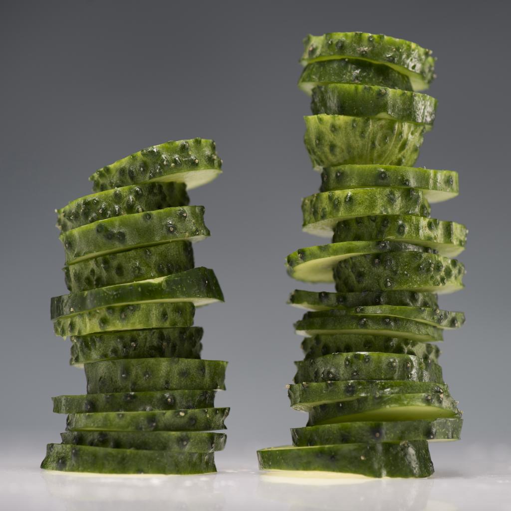 two stacks of sliced cucumbers - Photo, Image
