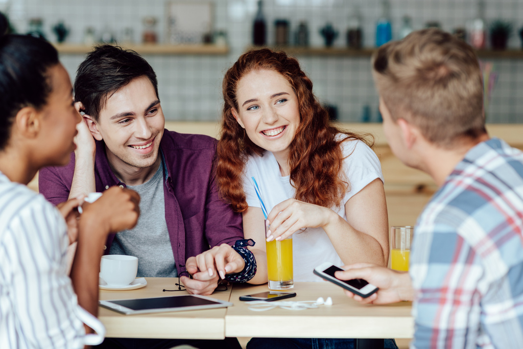 young couple with friends in cafe - Photo, Image