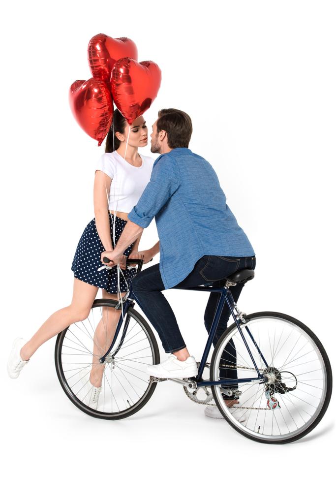 пара з велосипедом і повітряними кулями
 - Фото, зображення
