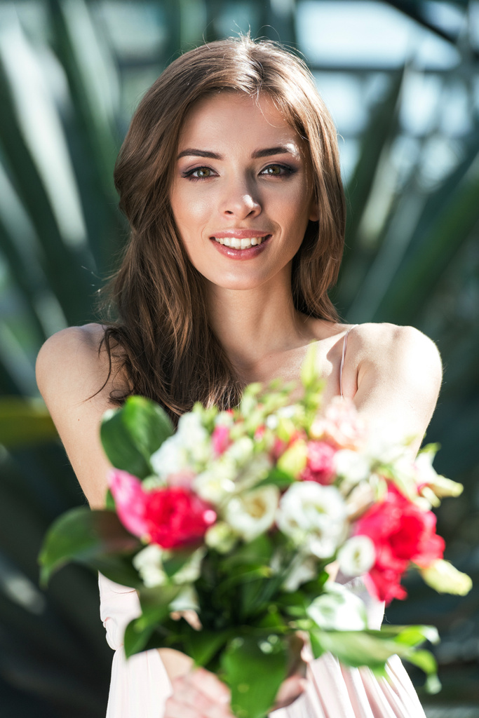 woman with flowers - Photo, Image