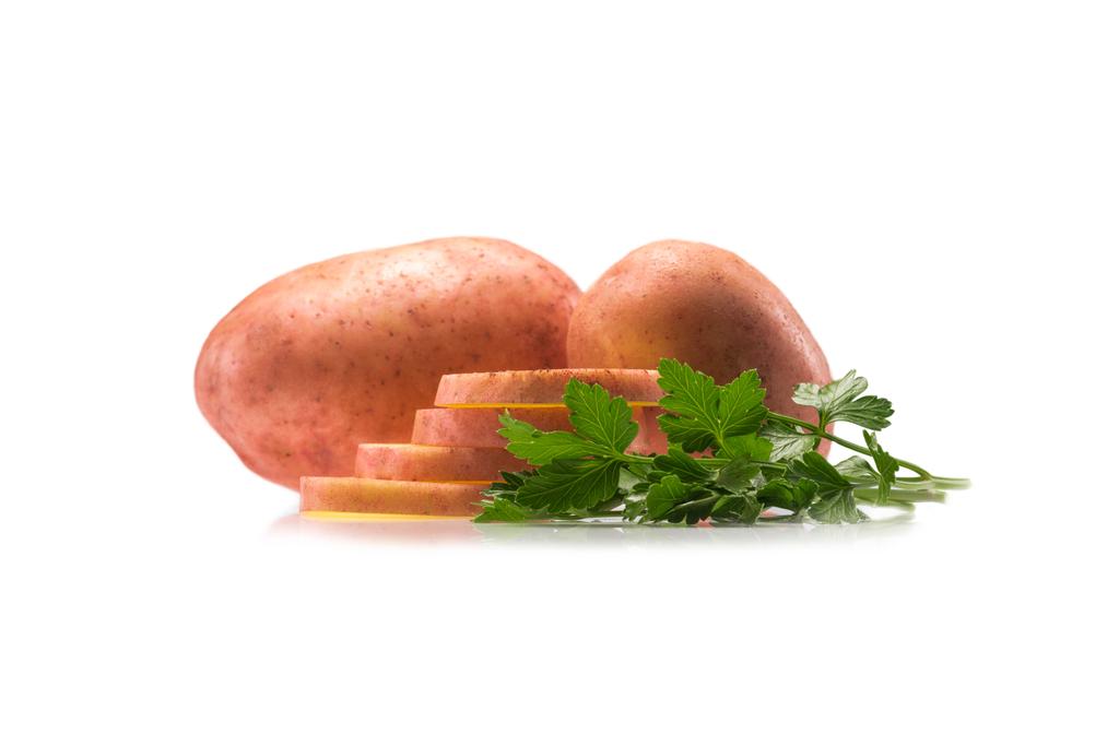 Сырой картофель и петрушка
 - Фото, изображение