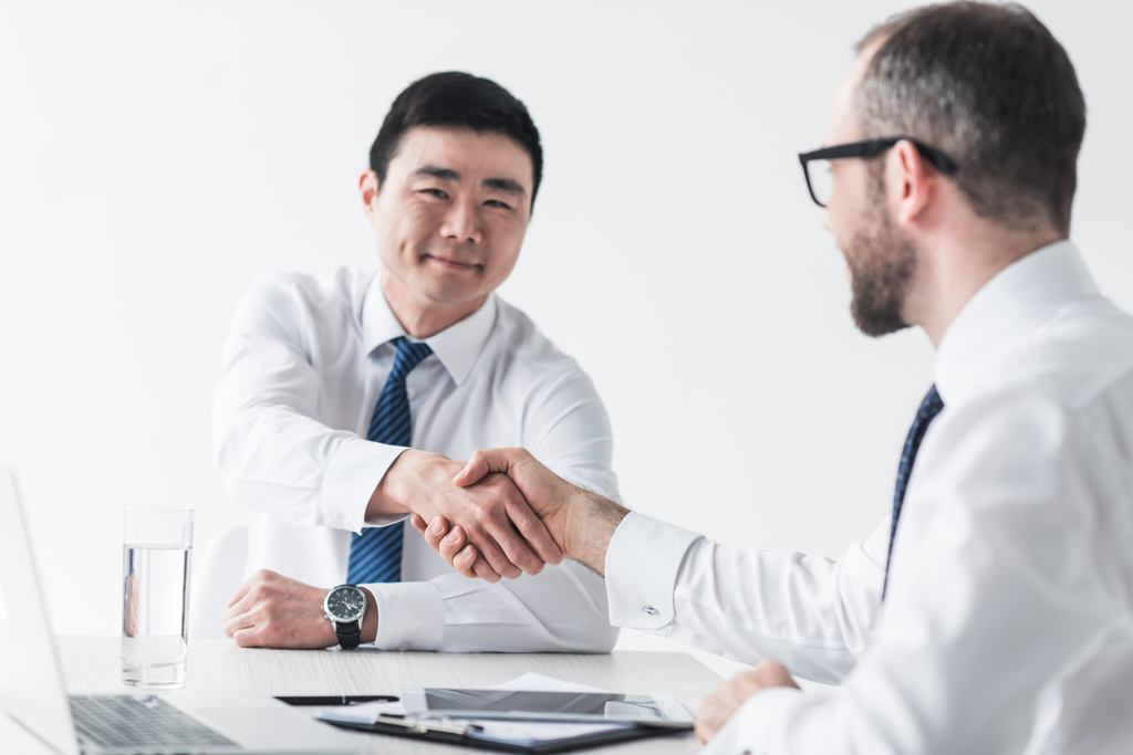 multicultural businessmen shaking hands on meeting - Photo, Image