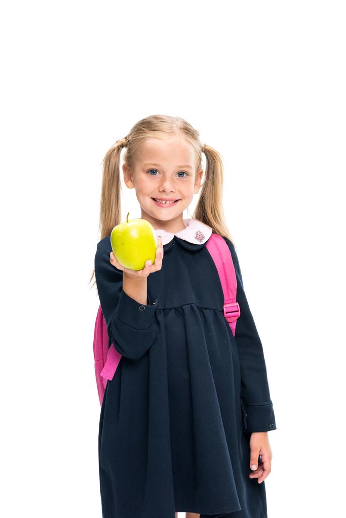 colegiala sosteniendo manzana
 - Foto, Imagen