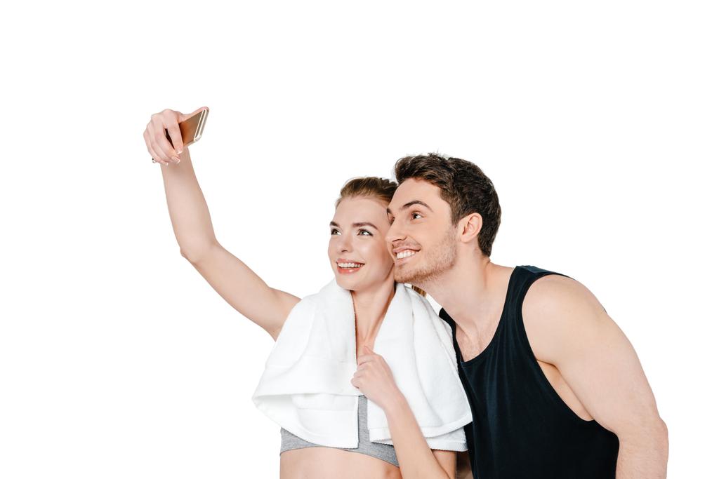 feliz en forma pareja tomando selfie
 - Foto, Imagen