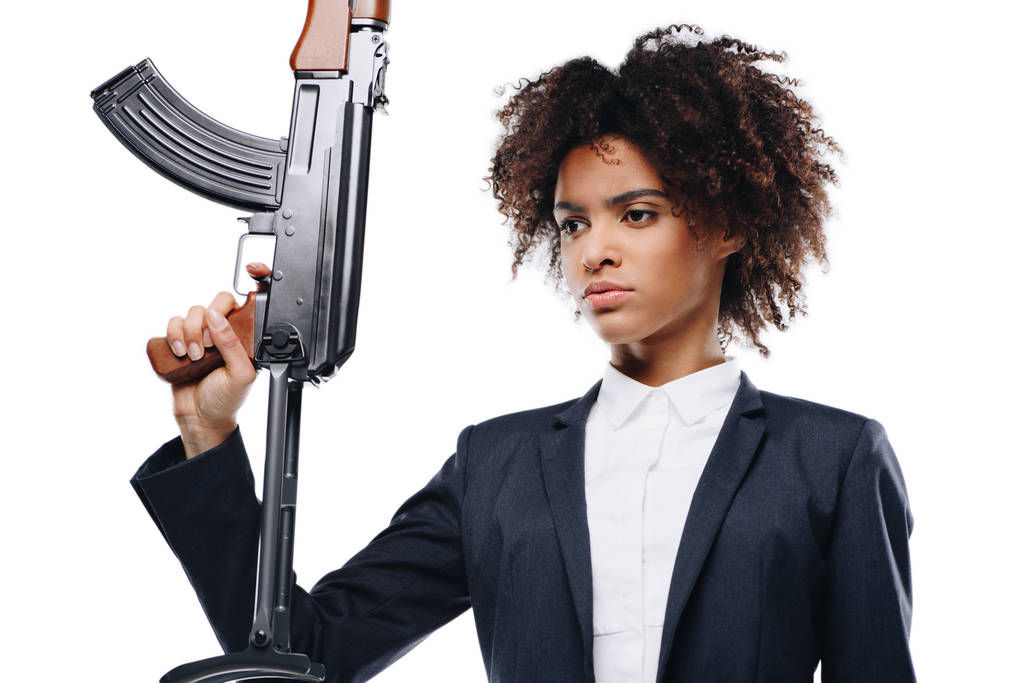 naispuolinen tappaja kiväärillä
 - Valokuva, kuva