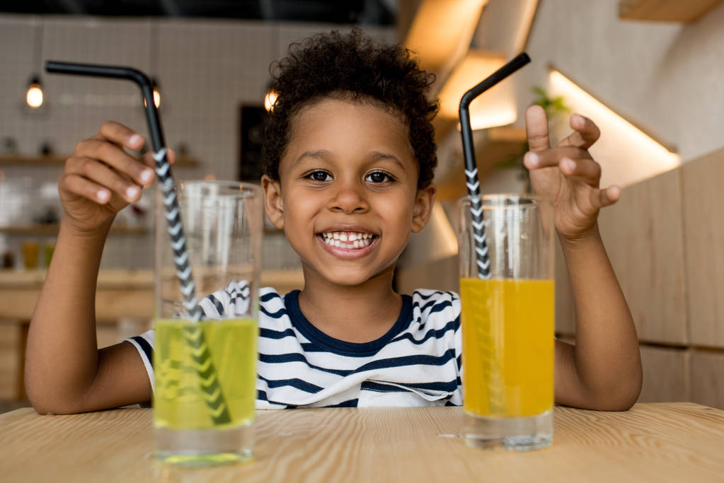 african american child drinking juice  - Photo, Image