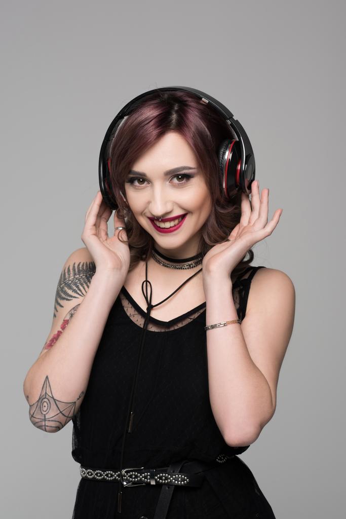 young woman listening to music in headphones - Photo, Image