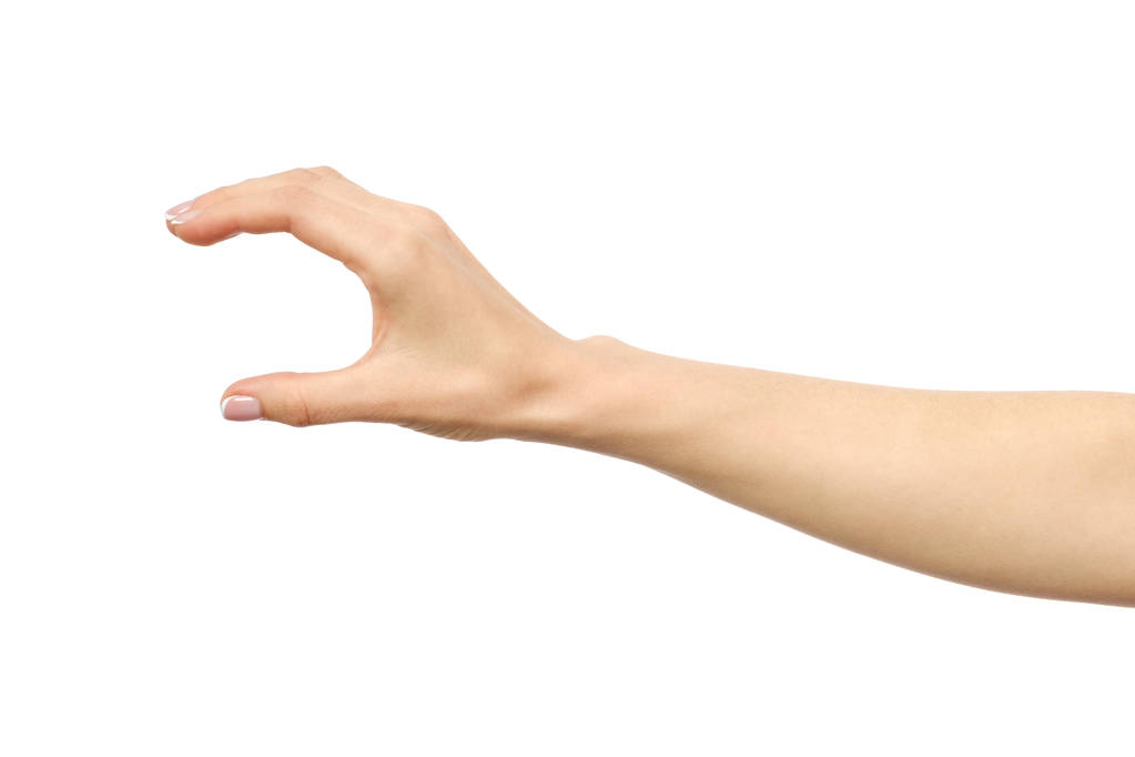 Woman's hand grabbing or measuring something - Photo, Image