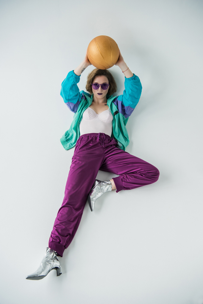stylish woman holding ball - Photo, Image
