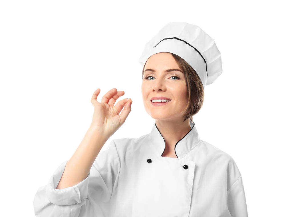 Vrouwelijke chef-kok op witte achtergrond - Foto, afbeelding