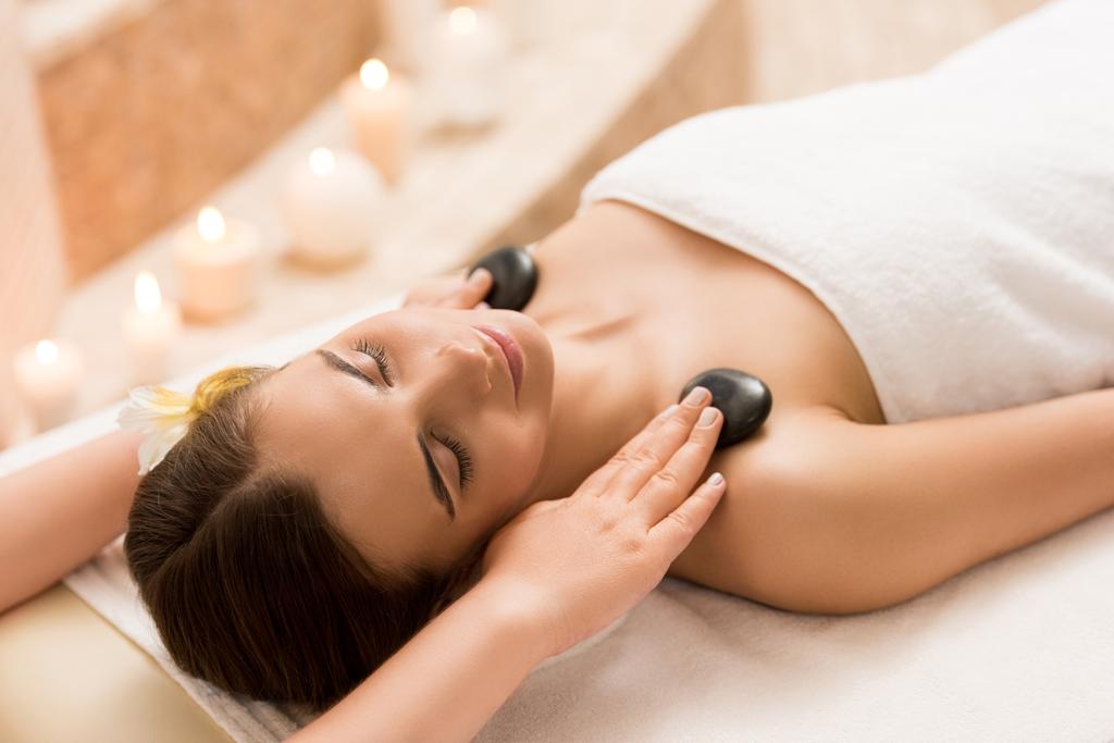 woman having stone massage - Photo, Image