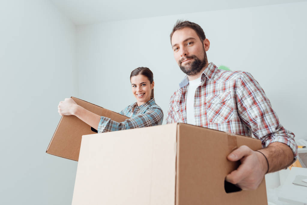 Young couple moving into house - Photo, Image