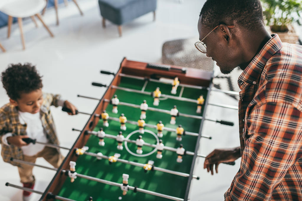 father and son playing playing foosball - Photo, Image