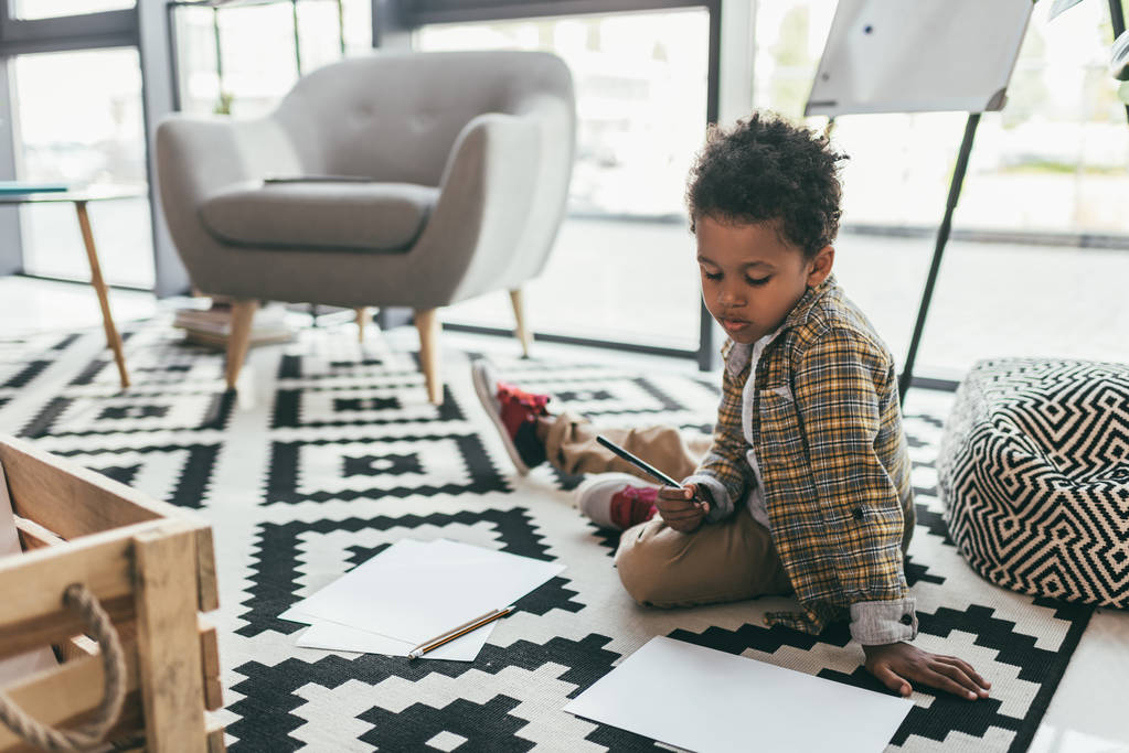 african american child drawing on floor - Photo, Image
