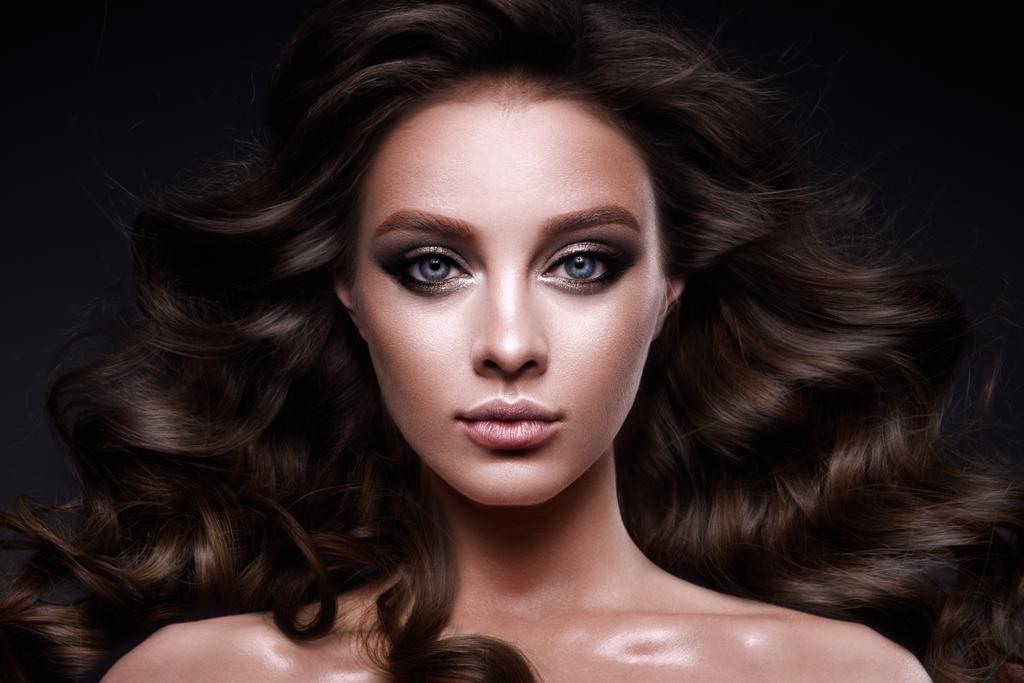 Beautiful young brunette with make-up - Photo, Image
