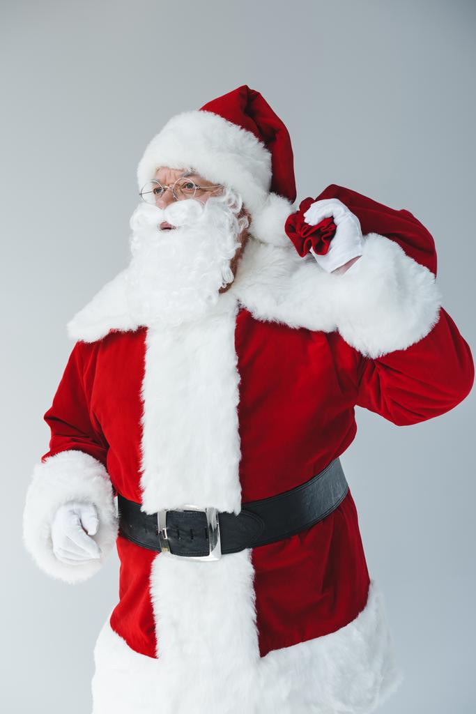 Санта Клаус з мішком
  - Фото, зображення