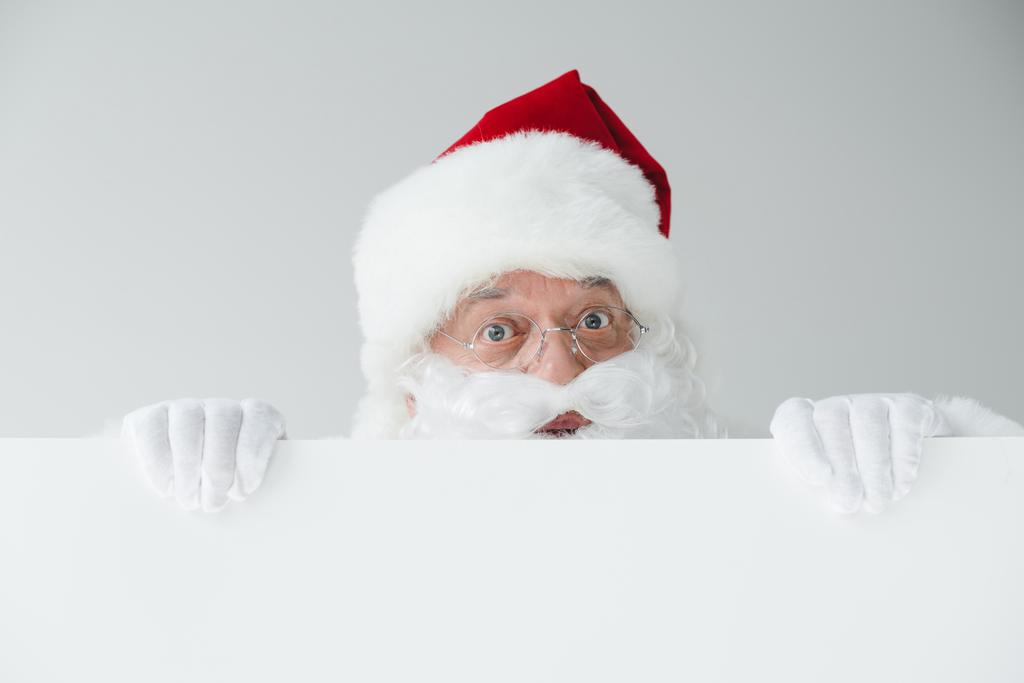 Santa con striscione bianco
 - Foto, immagini