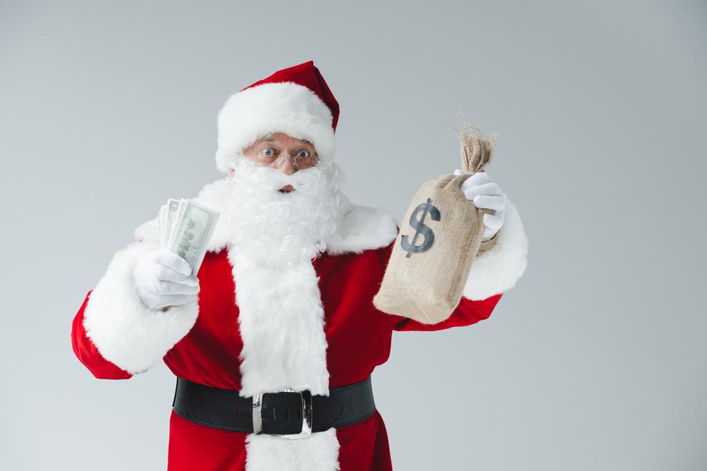 Santa Claus con billetes de dólar
 - Foto, imagen