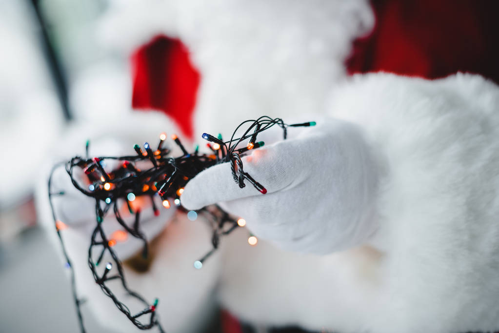 Santa bedrijf feestelijke slinger - Foto, afbeelding