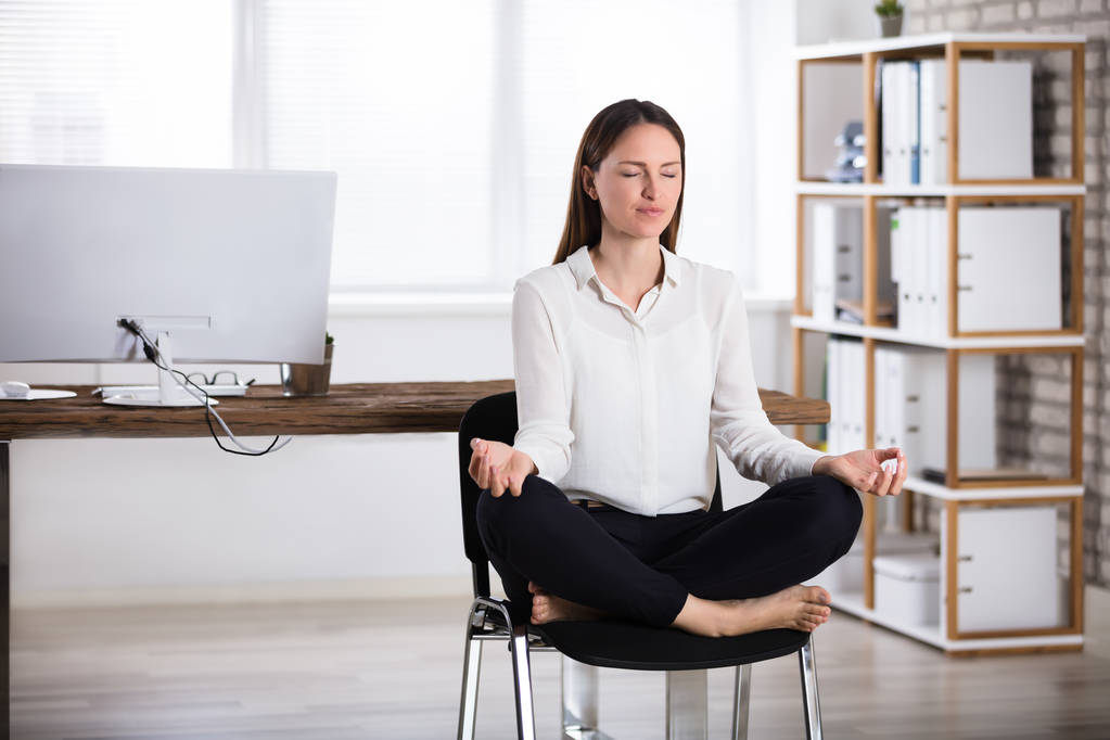 Businesswoman Doing Meditation - Photo, Image